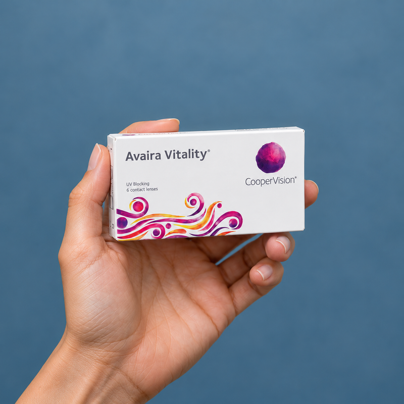 Hands holding avaira vitality contact lens packaging