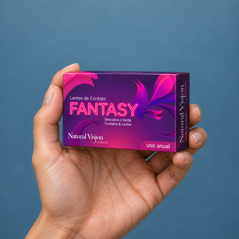Hands holding fantasy contact lens packaging