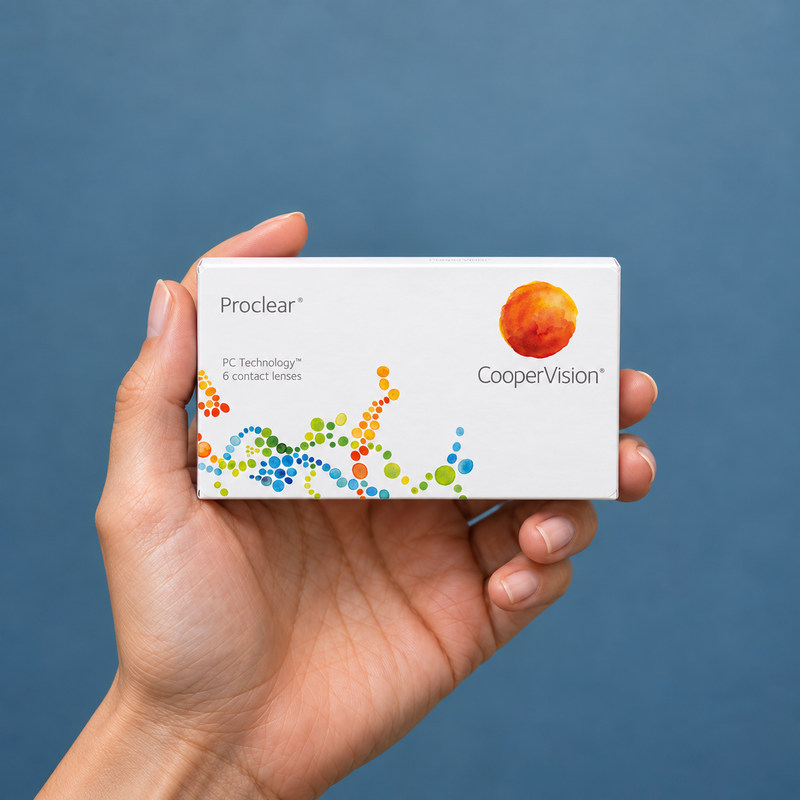 Hands holding proclear contact lens packaging