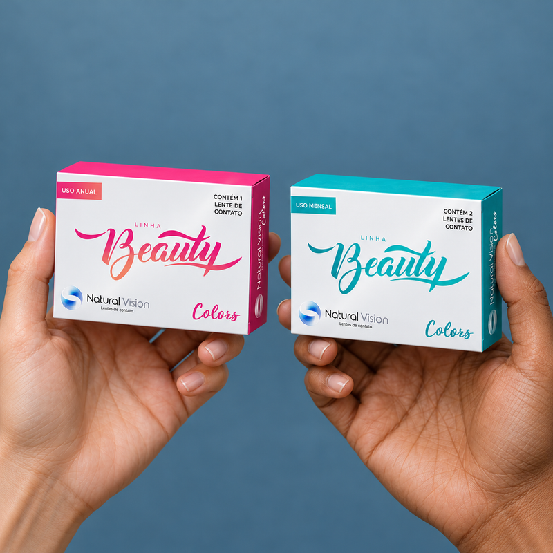Hands holding beauty contact lens packaging