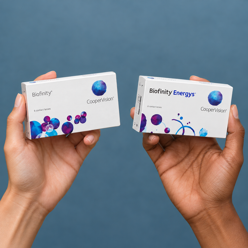 Hands holding biofinity contact lens packaging