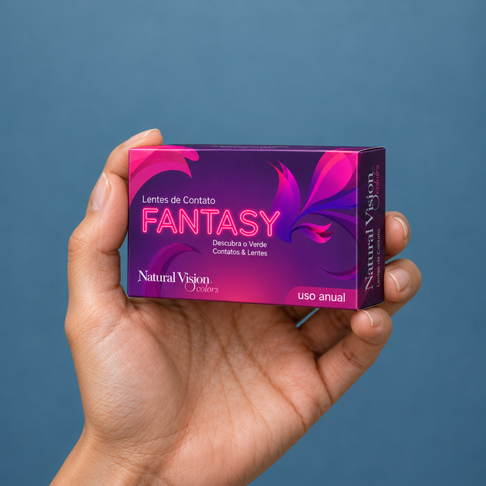 Hands holding fantasy contact lens packaging