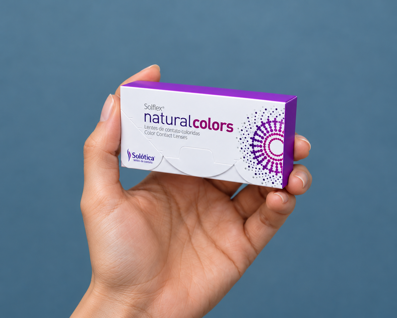 Hands holding solflex natural colors contact lens packaging